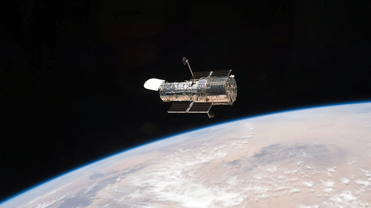 A Figure-Eight in Deep Space: Hubble Image Shows Gravity Warping Distant Galaxies