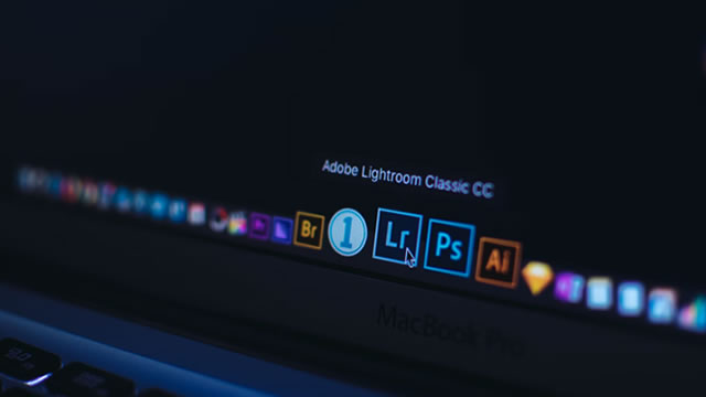 Adobe shares surge 15%, head for sharpest rally since 2020