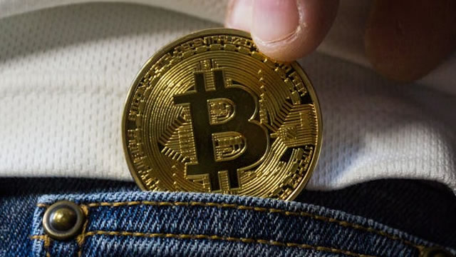 Bitcoin, Crypto-Tied Stocks Slip After Presidential Debate