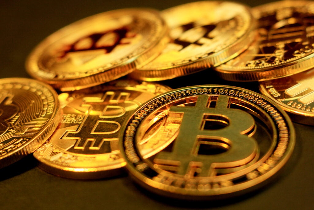 Bitcoin Nears $82,000 Resistance While Ethereum, XRP, Dogecoin Stay Muted Ahead Of Key Macro Week