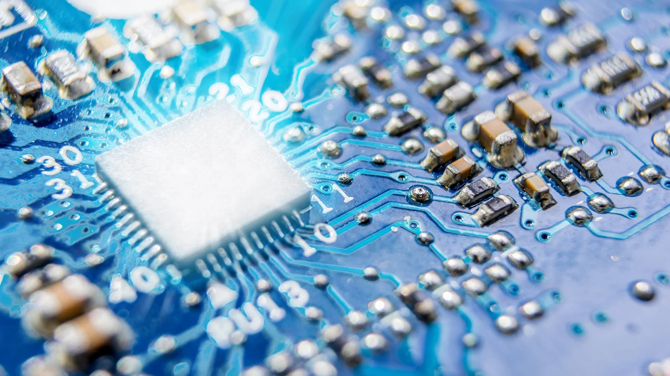 Broadcom Spikes 5% on Expanded Apple Chip Deal; Intel and AMD Drift Lower
