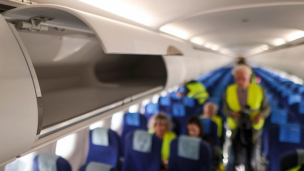 Budget airline Jetstar to charge passengers for storing bags in overhead compartments