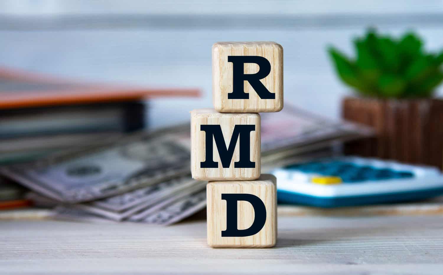 Can I reinvest my required minimum distribution into stocks or property without paying taxes twice?