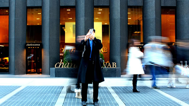 SCHW Stock News Image - benzinga.com
