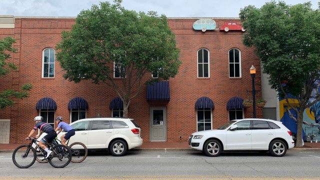 Craft cocktails, mountain bikes and art: Walmart's hometown is booming, and getting more expensive