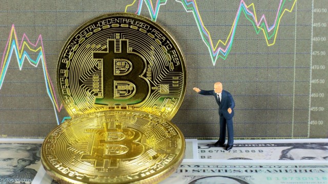 Cryptos and gold see losses in volatile day of trading as investors await Friday's PCE data