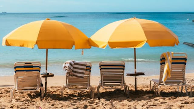 Expedia (EXPE) Q4 Earnings and Revenues Beat Estimates