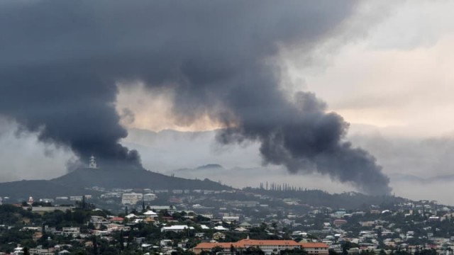 How is the violent unrest in New Caledonia impacting global nickel prices?