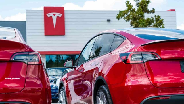 If you invested your $1,200 stimulus check in Tesla stock in 2020, here's what you'd have now
