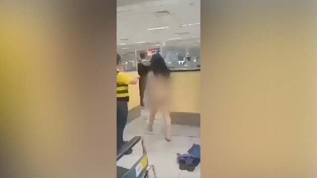 Naked woman in Philippines airport walks through security in fit over visa issue