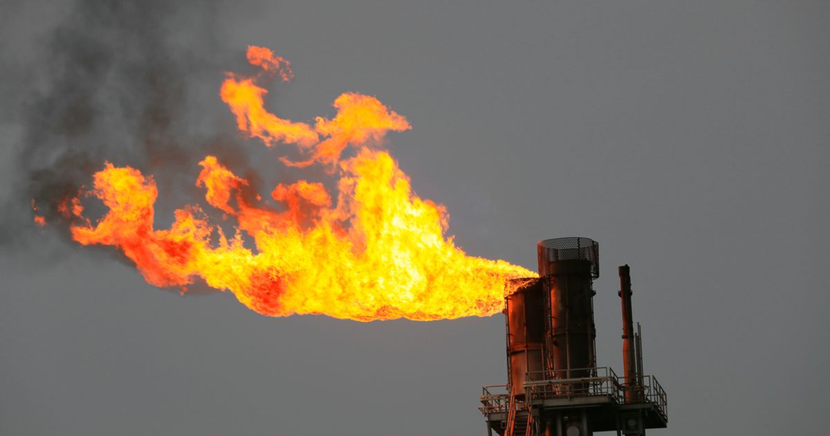 Nasdaq rises, Dow edges into the red as gas prices rocket