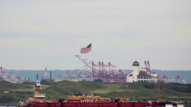 Oil flat as firming US gasoline demand offsets rate jitters