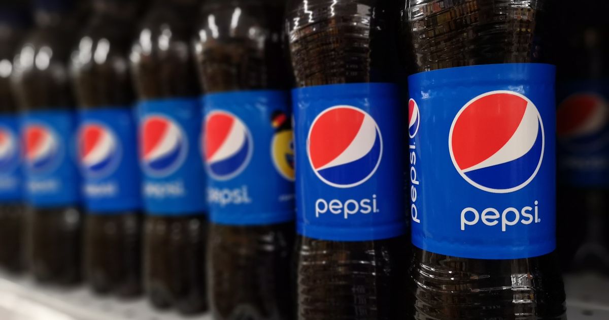 Pepsi posts mixed quarterly earnings, lowers sales forecast