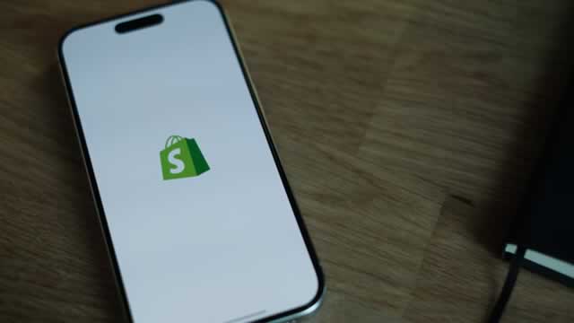 SHOP Stock News Image - benzinga.com