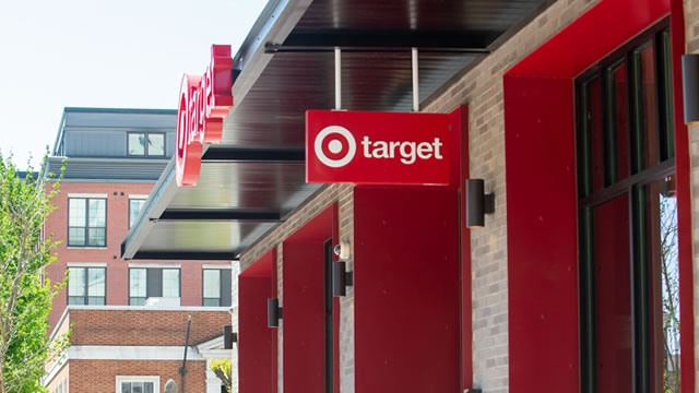 Target falls more than 20% after cutting full-year profit outlook