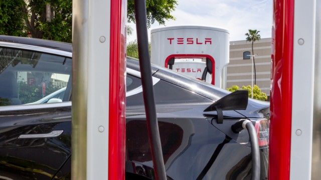 Tesla shares slip as automaker omits vehicle delivery goal from impact report