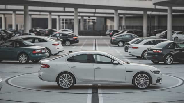 KMX Stock News Image - benzinga.com