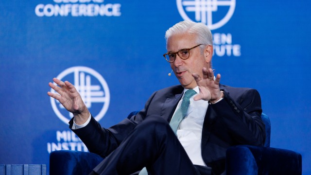 Wells Fargo CEO says corporate business, trading held back by asset cap