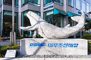 photo-url-https://images.financialmodelingprep.com/symbol/042660.KS.png